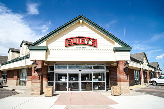 Guiry's Parker store front with a clear blue sky